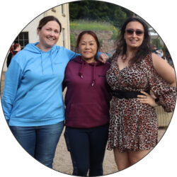 Three Hunter employees posing at Belmont Estate for Summer Purposefest 2025